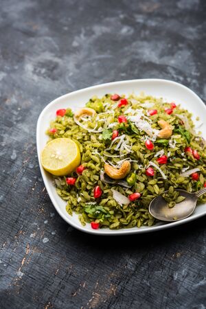 Hariyali Poha / Green Masala Pohe or flattened rice served in a bowl, selective focusの写真素材