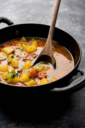 Lauki/doodhi ki Sabji also known as bottle gourd curry. served in a bowl or karahi. selective focusの写真素材