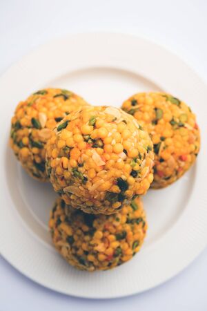 Jumbo Boondi Laddu mixed with dry fruits also know as laddoo/ ladoo/ laddo or Sweet dumplings made during festivals or weddingsの写真素材