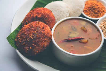 Podi idli is a quick and easy snack made with leftover idly. served with sambar and coconut chutney....