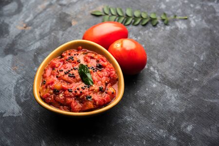 Tomato/tamatar chutney or sauce, served in a bowl. selective focusの写真素材