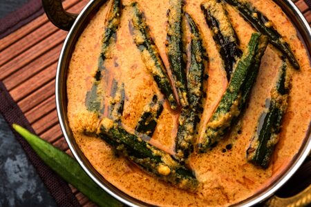 Hyderabadi Bhindi ka Salan or Okra salan made using ladies' fingers or ochro. Main course recipe from India. served in a bowl. selective focusの写真素材