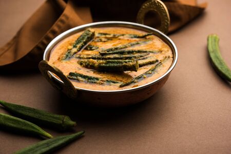 Hyderabadi Bhindi ka Salan or Okra salan made using ladies' fingers or ochro. Main course recipe from India. served in a bowl. selective focusの写真素材