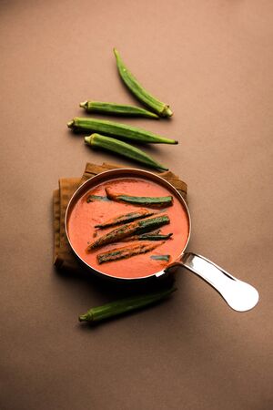 Hyderabadi Bhindi ka Salan or Okra salan made using ladies' fingers or ochro. Main course recipe from India. served in a bowl. selective focusの写真素材