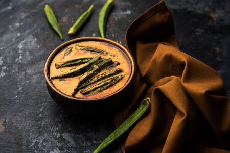 Hyderabadi Bhindi ka Salan or Okra salan made using ladies' fingers or ochro. Main course recipe from India. served in a bowl. selective focusの写真素材