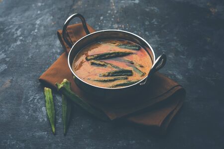 Hyderabadi Bhindi ka Salan or Okra salan made using ladies' fingers or ochro. Main course recipe from India. served in a bowl. selective focusの写真素材