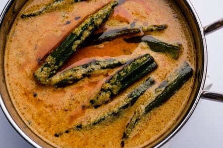 Hyderabadi Bhindi ka Salan or Okra salan made using ladies' fingers or ochro. Main course recipe from India. served in a bowl. selective focusの写真素材
