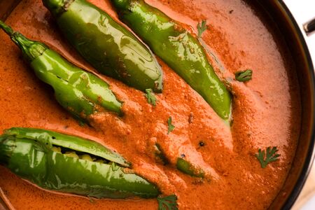 Hyderabadi mirch/mirchi ka Salan or green chilly sabzi or curry. Main course recipe from India. served in a bowl. selective focusの写真素材