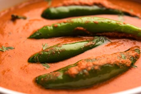 Hyderabadi mirch/mirchi ka Salan or green chilly sabzi or curry. Main course recipe from India. served in a bowl. selective focusの写真素材