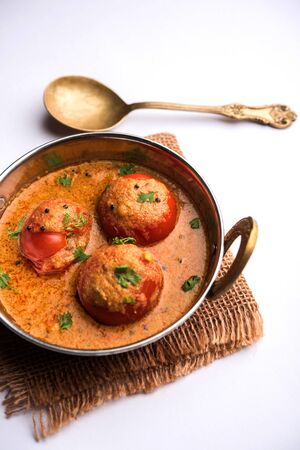 Tomato Salan or Tamatar sabzi or curry. Main course recipe from India. served in a bowl. selective focusの写真素材