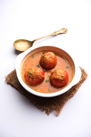 Tomato Salan or Tamatar sabzi or curry. Main course recipe from India. served in a bowl. selective focusの写真素材