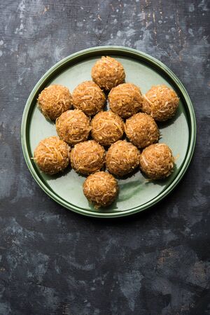 Jaggery coconut Laddoo / Nariyal gur ke laddu, indian sweet food for festivals like rakshabandhan/rakhi pournimaの写真素材