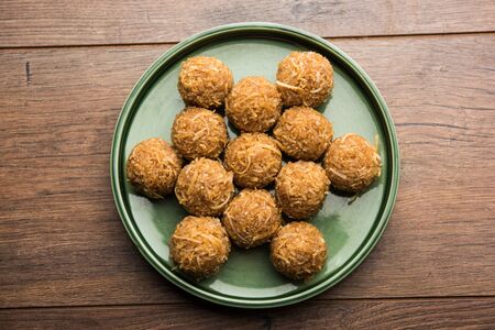 Jaggery coconut Laddoo / Nariyal gur ke laddu, indian sweet food for festivals like rakshabandhan/rakhi pournimaの写真素材