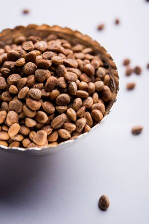 Indian charoli / charolya / Buchanania lanzan / Almondette kernel seeds in a bowl or pile. selective focusの写真素材