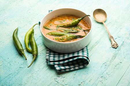 Hyderabadi mirch/mirchi ka Salan or green chilly sabzi or curry. Main course recipe from India. Served in a bowl. Selective focusの写真素材