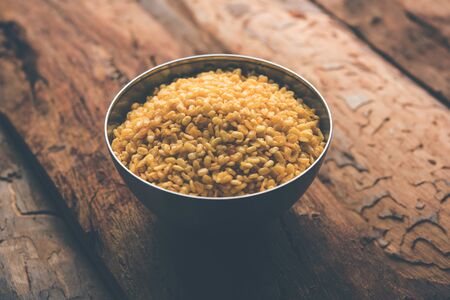 Salty and Fried Moong Dal / crispy Mung Namkeen served in a bowl, selective focusの写真素材