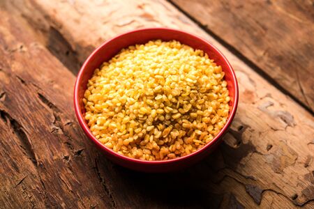 Salty and Fried Moong Dal / crispy Mung Namkeen served in a bowl, selective focusの写真素材
