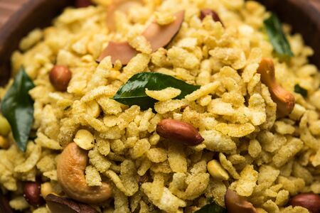 Jada Poha Namkeen Chivda / Thick Pohe Chiwda is a jar snack with a mix of sweet, salty and nuts flavours, selective focusの写真素材