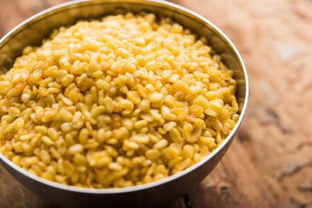 Salty and Fried Moong Dal / crispy Mung Namkeen served in a bowl, selective focusの写真素材