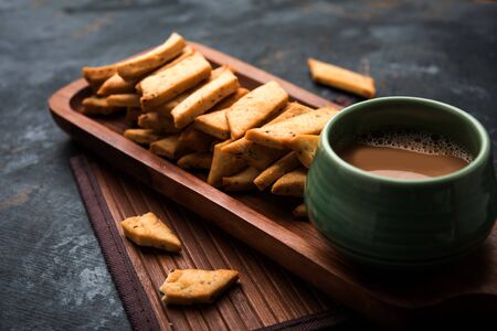 Namakpare or Salty Shakarpara/shakarpare or namkeen Shankarpali, popular diwali food or tea-time snack from Gujarat, Indiaの写真素材