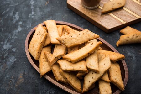 Namakpare or Salty Shakarpara/shakarpare or namkeen Shankarpali, popular diwali food or tea-time snack from Gujarat, Indiaの写真素材