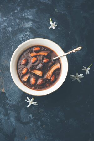 ambrosia or Panchamrit or Panchamrut or Panchamrutham or Panchamrutha is a sweet and sour food offered in prayers or puja to hindu Deity or godsの写真素材