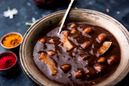 ambrosia or Panchamrit or Panchamrut or Panchamrutham or Panchamrutha is a sweet and sour food offered in prayers or puja to hindu Deity or godsの写真素材