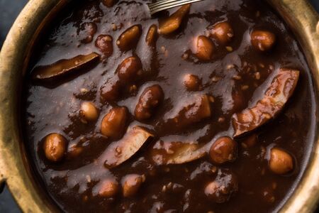 ambrosia or Panchamrit or Panchamrut or Panchamrutham or Panchamrutha is a sweet and sour food offered in prayers or puja to hindu Deity or godsの写真素材