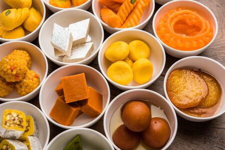Rangoli of Assorted Indian sweets/mithai in bowl for Diwali or any other festivals, selective focusの写真素材
