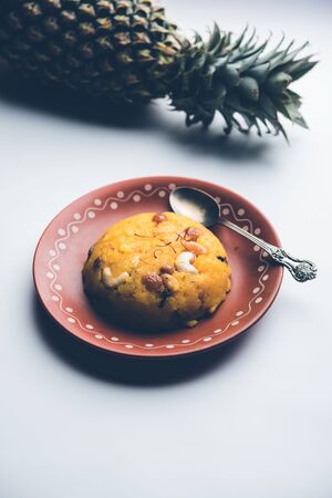 Pineapple sheera or Halwa also known as Ananas keshri shira. Popular South Indian Dessert recipe. selective focusの写真素材