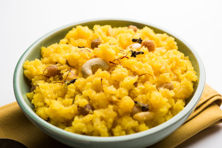 Pineapple sheera or Halwa also known as Ananas keshri shira. Popular South Indian Dessert recipe....