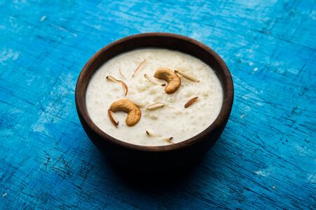 Rice Kheer or Firni or Chawal ki Khir is a pudding from Indian subcontinent, made by boiling milk ,sugar and Rice. Served in a bowlの写真素材
