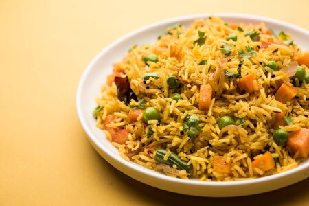 Tawa Pulao/Pulav/Pilaf/Pilau is an Indian Street Food  made using basmati rice, vegetables and spices. Selective focusの写真素材