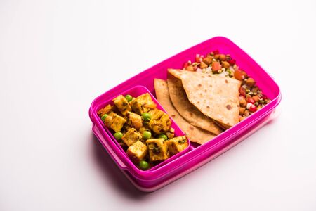 Lunch Box / Tiffin for Indian kids, hot Hot Paneer sabzi with roti / chapatiの写真素材