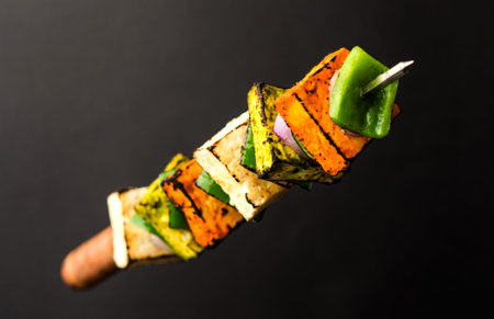 Food  Levitation - Flying Paneer Tikka isolated over white or black background, selective focusの写真素材