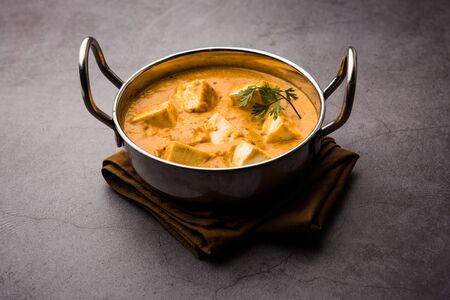 Paneer Korma, Kurma or Quorma is a popular Indian main course recipe made using cottage cheese with curry made of curd, coconut and cashew nutsの写真素材