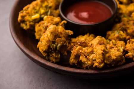 Crispy Corn pakora/pakoda, bhajji, Bhaji, bajji or pattice . served with tomato ketchupの写真素材