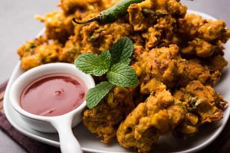 Crispy Corn pakora/pakoda, bhajji, Bhaji, bajji or pattice . served with tomato ketchupの写真素材