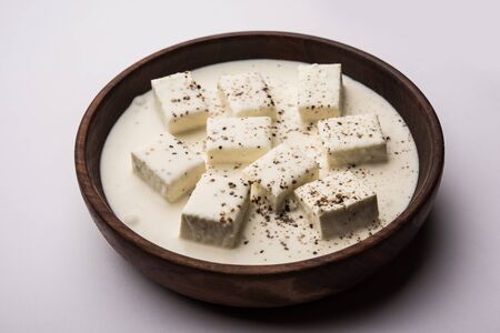 Paneer Dum Kali Mirch / Kalimirch, prepared in a white creamy gravy and black pepper powder sprinkled over it.の写真素材