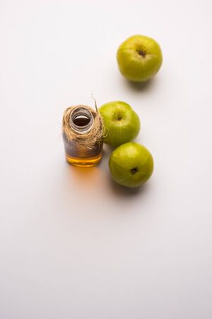 Amla oil is a natural Ayurvedic oil used for hair health that contains extracts from the Indian gooseberry or Phyllanthus emblicaの写真素材