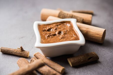 Ayurvedic Liquorice sandalwood Face Mask made using Mulethi or jeshthamadh and Chandan powder. selective focusの写真素材