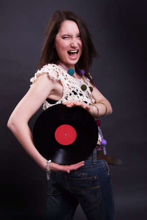 expressional the girl with a vinylの写真素材
