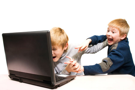 Two boys use notebook. White background