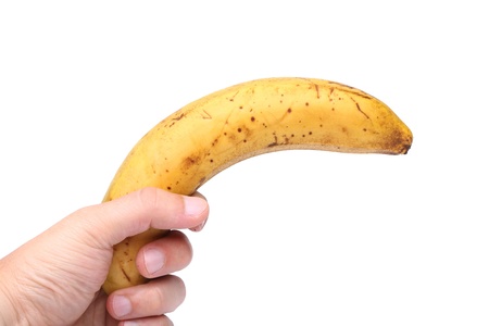 A stale banana in a handの写真素材