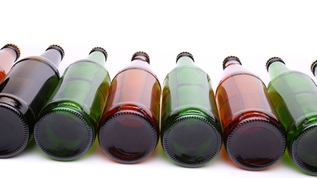 Bottles lying in perspective on the whita backgroundの写真素材