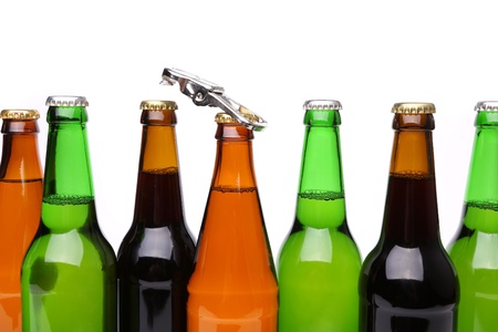 Different bottlenecks with a bottle openerの写真素材