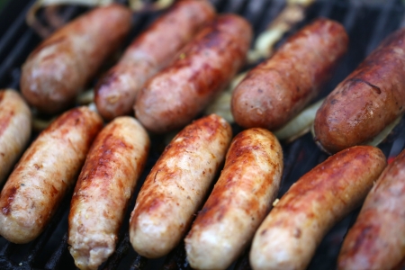 A lot of grilled sausages close up, barbecueの写真素材