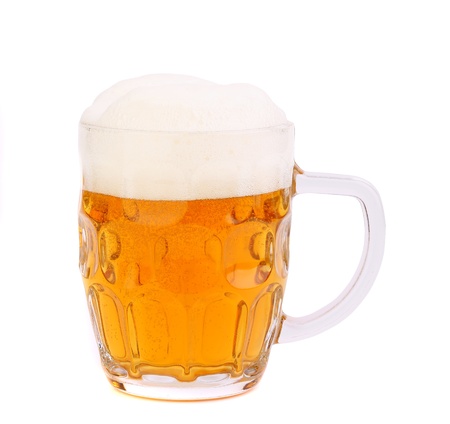 mug of beer with froth isolated on whiteの写真素材