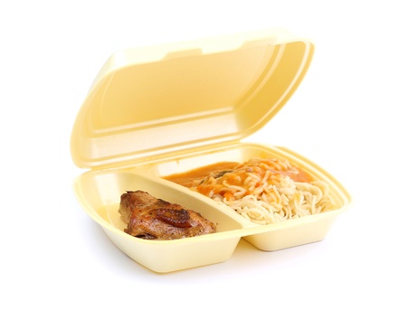 A chicken and a pasta in the disposable box door-to-door deliveryの写真素材