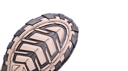 Boot sole on a white background close up.の写真素材